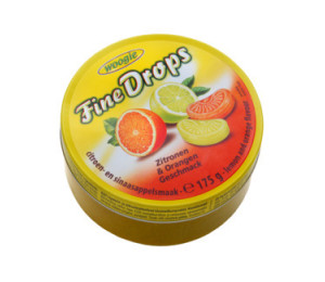 Woogie Fine Drops bonbny s pchut pomeran-citron v kovov krabice 200g